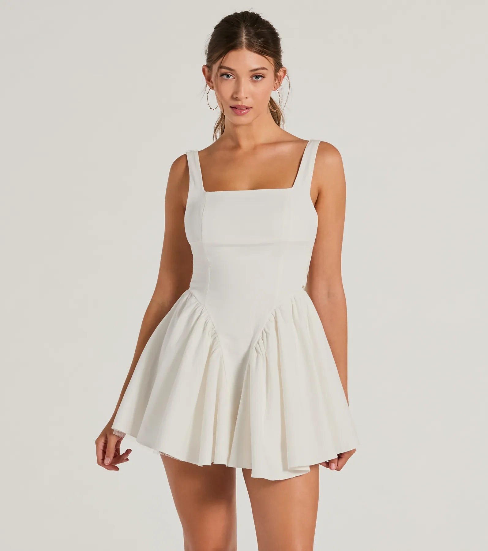 05101-3410_1_IVORY_StunningSweetieOpenBackBowSkaterDress_42b31d63-4a6e-4128-b6c1-2e25d54896bc Stunning Sweetie Open Back Bow Skater Dress - Image 1