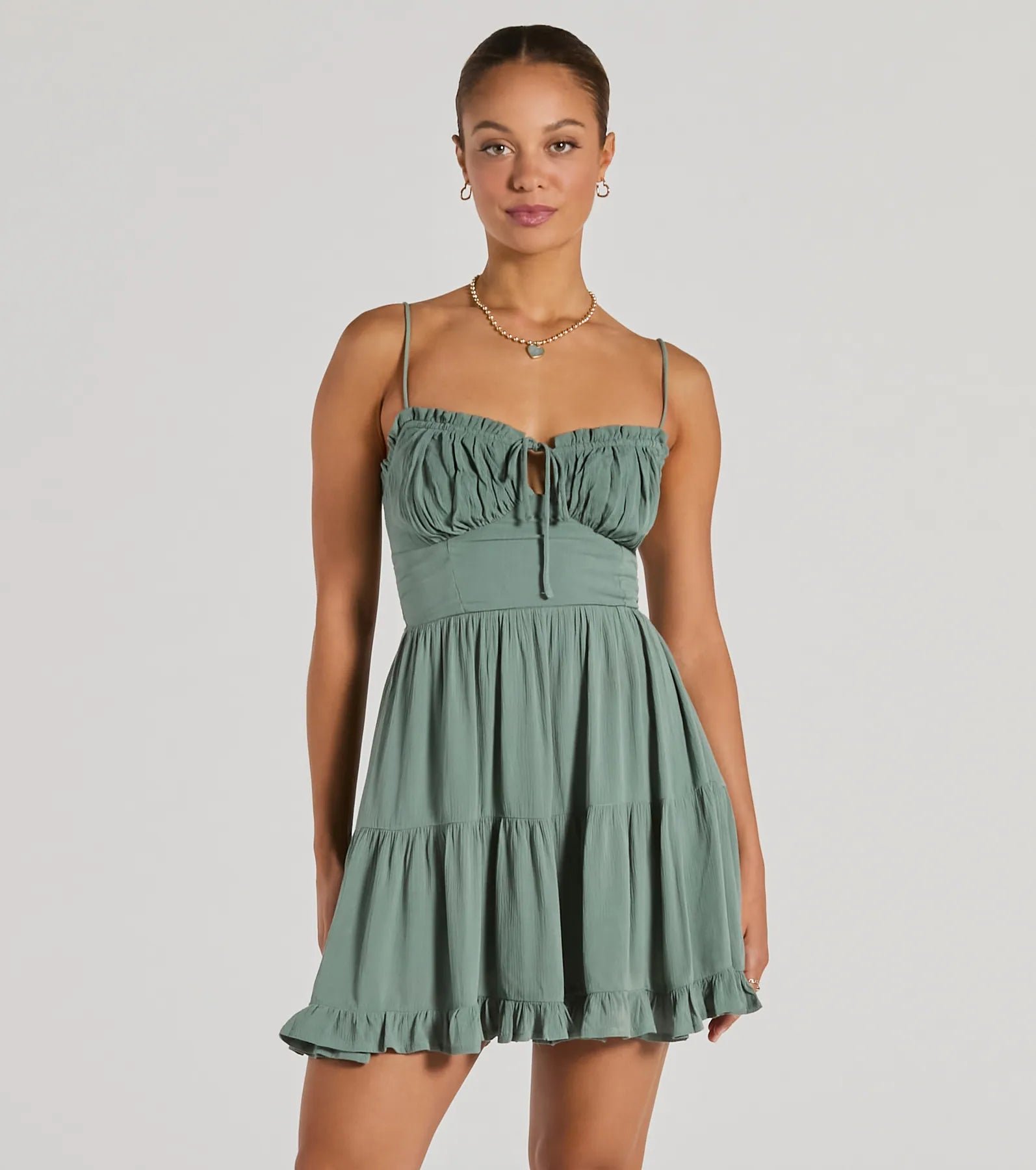 05102-5499_1_SAGE_ASweetLookSleevelessRuffledSkaterDress A Sweet Look Sleeveless Ruffled Skater Dress - Image 1